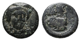 Sicily, Gela, c. 315-310 BC. Æ (13mm, 2.79g). Head of Demeter facing slightly r., wearing wreath of grain ears. R/ Horned and bearded head of Gelas l....