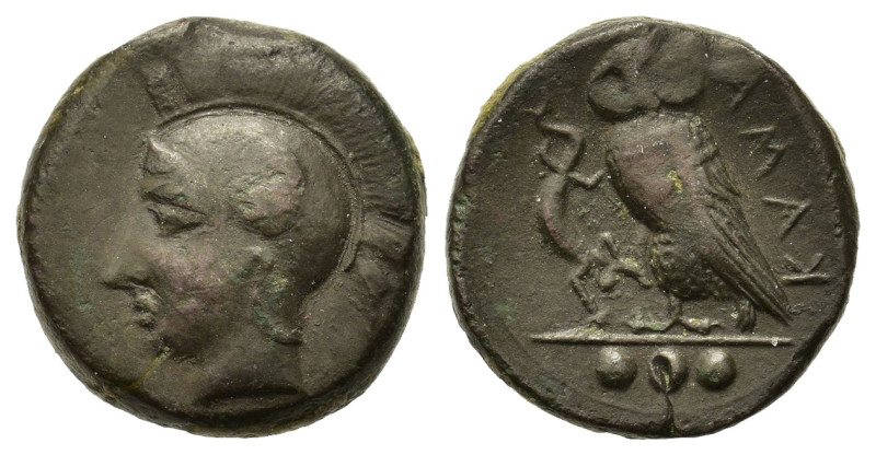 Sicily, Kamarina, c. 420-405 BC. Æ Tetras or Trionkion (14,9mm, 3.9g). Helmeted ...