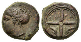 Sicily, Syracuse, c. 405 BC. Æ Hemilitron (14,5mm, 3.8g). Head of Arethusa l., hair in ampyx and sphendone; to r. dolphin. R/ Four-spoked wheel; ΣY-PA...