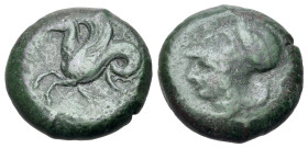 Sicily, Syracuse, c. 400 BC. Æ Litra (19mm, 8.52g, 6h). Helmeted head of Athena l., two dolphins in fields. R/Hippocamp to l. SNG ANS 447; Calciati II...