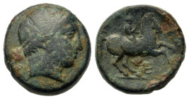 Kings of Macedon. Philip II (359-336 BC). Æ Unit (16mm, 6.5g). Uncertain mint in Macedon. Head of male r., wearing tainia. R/ Horseman riding r.; E be...