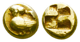Ionia, Phokaia EL Hekte. Circa 478-387 BC. Siren, with female human head and the body of a bird, standing to left; small seal above, swimming downward...