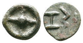 Moesia, Istros Æ. 5th century BC. Four-spoked wheel / IΣT. Reference: Condition: Very Fine

Weight: 1,53 gr. Diameter: 12,6 mm