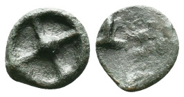 Moesia, Istros Æ. 5th century BC. Four-spoked wheel / IΣT. Reference: Condition: Very Fine

Weight: 0,96 gr. Diameter: 11,5 mm