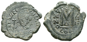 Maurice Tiberius (582-602 AD). Constantinople AE Follis Obv: D N MAVRC P P AVG, crowned, draped and cuirassed bust facing, holding cross on globe and ...