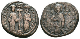 CONSTANTINE X DUCAS with EUDOCIA (1059-1067). Follis. Constantinople. Obv: + ЄMMANOVHΛ / IC - XC. Christ Pantokrator standing facing on footstool. Rev...