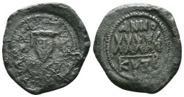 Phocas AD 602-610. year 6 (607/8). Cyzicus.Follis Æ Crowned facing bust, wearing consular robes, holding mappa and eagle sceptre with cross; small cro...