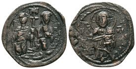 CONSTANTINE X DUCAS with EUDOCIA (1059-1067). Follis. Constantinople. Obv: + ЄMMANOVHΛ / IC - XC. Christ Pantokrator standing facing on footstool. Rev...