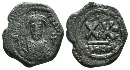 Byzantine, Phocas (602-610) AE half Follis. Nicomedia Obv: Crowned and cuirassed facing bust, holding mappa and cross Rev: Large XX, cross above, date...