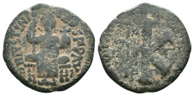 Justinian I.527-565. AE half follis Antioch mint. DN IVSTINIANVS PP AVG, Justinian seated facing, holding long scepter and globus cruciger' Rev: Large...