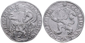 Netherlands AR Lion Taler. Holland, 1589. MO NO ARG ORDIN HOL, Knight over lion shield / CONFIDENS DNO NON MOVETVR, Rampant lion left. Delmonte 831; D...