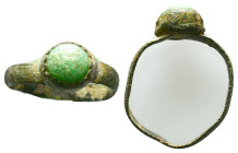 Ancient Roman Bronze Ring with a stone inlaid on bezel, circa 1st - 3rd AD. Reference: Condition: Very Fine

Weight: 1,41 gr. Diameter: 22,5 mm