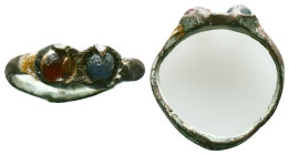 Ancient Roman Lucky Ring with two stones, Ae Bronze, 1st - 3rd century AD Reference: Condition: Very Fine

Weight: 2,26 gr. Diameter: 22,5 mm