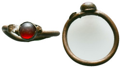Ancient Roman Bronze Ring with a stone inlaid on bezel, circa 1st - 3rd AD. Reference: Condition: Very Fine

Weight: 2,21 gr. Diameter: 23,3 mm