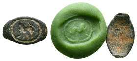 Ancient Roman Bronze Ring Bezel Reference: Condition: Very Fine

Weight: 0,58 gr. Diameter: 12,4 mm