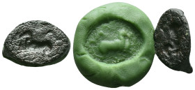Ancient Roman Bronze Ring Bezel Reference: Condition: Very Fine

Weight:5.12 gr. Diameter: 20.9 mm