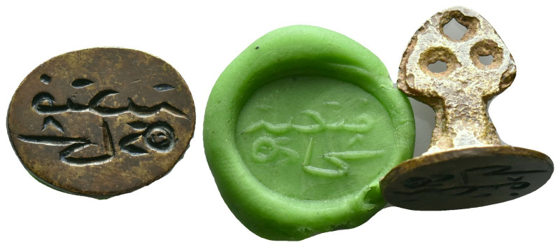 Ancient Islamic Bronze stamp seal Reference: Condition: Very Fine

Weight: 6,1...