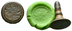 Ancient Islamic Bronze stamp seal Reference: Condition: Very Fine

Weight: 7,10 gr. Diameter: 21,0 mm