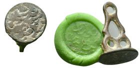 Ancient Islamic Bronze stamp seal Reference: Condition: Very Fine

Weight: 4,74 gr. Diameter: 25,8 mm