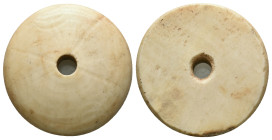 Bone Spindle Whorl .(8th-12th century). Reference: Condition: Very Fine

Weight: 6,54 gr. Diameter: 29,5 mm
