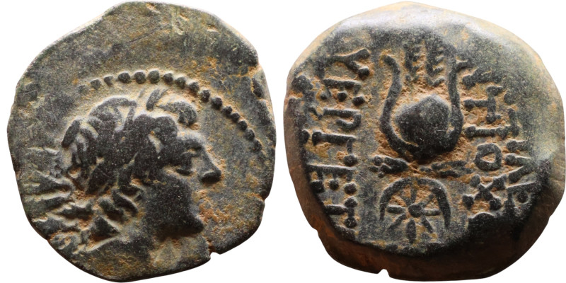 Antiochos VII (Seleukid King: 138-129 BC). AE bronze. Obv.: Bust of winged Eros ...