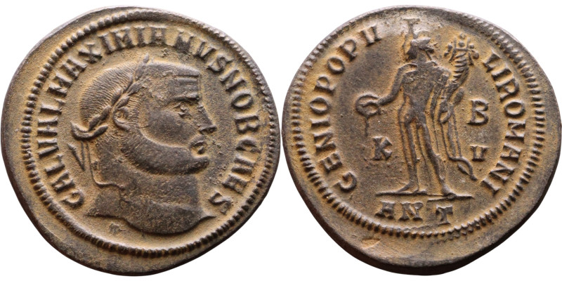 Maximianus (286-305 AD). AE follis. Obv.Laureate head right. Rev.: Genius standi...