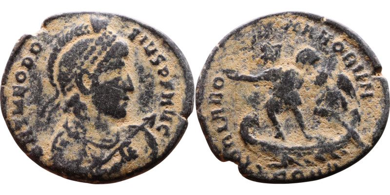 Theodosius I (379-395 AD). Follis. Obv.: Diademed, helmeted, draped, and cuirass...