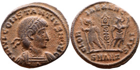 Constantius II (Caesar: 324-337) Follis. Obverse:  Laureate, draped, cuirassed bust right. Reverse: GLORIA EXERCITVS, two Soldiers standing front, hea...
