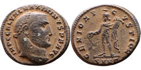 Maximinus Daza (305-313) Follis Obv: Laureate head right. Rev.: Genius standing left holds cornucopia