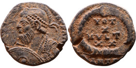 Julian II Apostate (361-363) Follis. Obverse: DN FL CL IVLIANVS PF AVG, Helmeted and cuirassed bust left, holding spear and shield Reverse: VOT X MVLT...