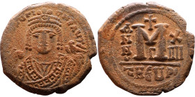 Maurice Tiberius (582-602) Follis Obverse: Crowned bust facing, wearing consular robes, holding mappa and eagle-tipped scepter , Reverse: Large M cros...