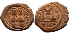 Justin II and Sophia (565-578) Follis Obverse: DN IVSTINVS PP AVG Justin and Sophia on thrones Reverse: Large M between ANNO and regnal year, above cr...