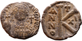 Justinian I (527-565) Half Follis. Obverse: DN IVSTINIANVS PP AVG, Armoured facing bust holding globus Reverse: Large M between ANNO and regnal year