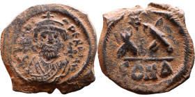 Phocas (602-610) Half Follis. Obverse: DN FOCA PERP AVG Crowned bust facing, wearing consular robes, holding mappa and eagle-tipped scepter , Reverse:...