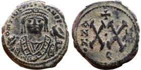 Maurice Tiberius (582-602)  Half Follis Obverse: Crowned bust facing, wearing consular robes, holding mappa and eagle-tipped scepter , Reverse: Large ...