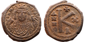 Maurice Tiberius (582-602)  Half Follis Obverse: Crowned bust facing, wearing consular robes, holding mappa and eagle-tipped scepter , Reverse: Large ...