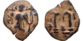 Constans II (641-668) Follis. Obverse: Imperial figure holding cross and globus Reverse: m and inscription