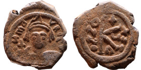 Maurice Tiberius (582-602) Half Follis. Obverse: Helmeted and cuirassed bust facing, holding globus cruciger and shield., Reverse: Large K above cross...