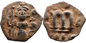 Constans II (641-668) Follis. Obverse: Imperial figure holding cross and globus Reverse: m and inscription