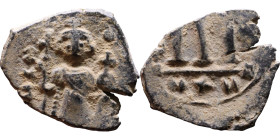 Constans II (641-668) Follis. Obverse: Imperial figure holding cross and globus Reverse: m and inscription