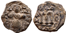 Constans II (641-668) Follis. Obverse: Imperial figure holding cross and globus Reverse: m and inscription