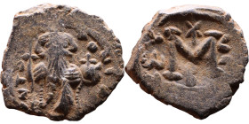 Constans II (641-668) Follis. Obverse: Imperial figure holding cross and globus Reverse: m and inscription