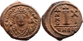 Maurice Tiberius (582-602)  Decanummium Obverse: Crowned bust facing, wearing consular robes, holding mappa and eagle-tipped scepter , Reverse: Large ...