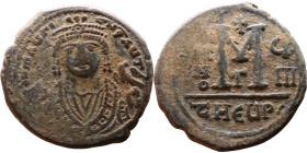 Maurice Tiberius (582-602) Follis Obverse: Crowned bust facing, wearing consular robes, holding mappa and eagle-tipped scepter , Reverse: Large M cros...