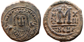Maurice Tiberius (582-602) Follis Obverse: Crowned bust facing, wearing consular robes, holding mappa and eagle-tipped scepter , Reverse: Large M cros...