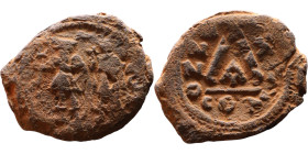 Heraclius (610-641) Half Follis. Obverse: Helmeted and cuirassed bust facing, holding globus cruciger and shield., Reverse: Large K above cross, ANNO
