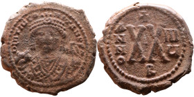 Maurice Tiberius (582-602)  Half Follis Obverse: Crowned bust facing, wearing consular robes, holding mappa and eagle-tipped scepter , Reverse: Large ...