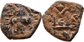 Constans II (641-668) Follis. Obverse: Imperial figure holding cross and globus Reverse: m and inscription