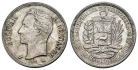 Venezuela. 1 bolivar. 1960. Paris. (Km-Y37a). Ag. 5,03 g. Delicate patina. Traces of luster. AU. Est...35,00. 

Spanish description: Venezuela. 1 bo...
