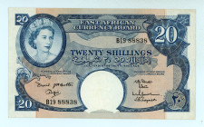 East Africa
East African Currency Board
20 Shillings, ND (1961)
S/N B19 88838
Printer: TDLR
Pick 43a; TBB 229

Extremely fine.

From the “Yankee” Coll...